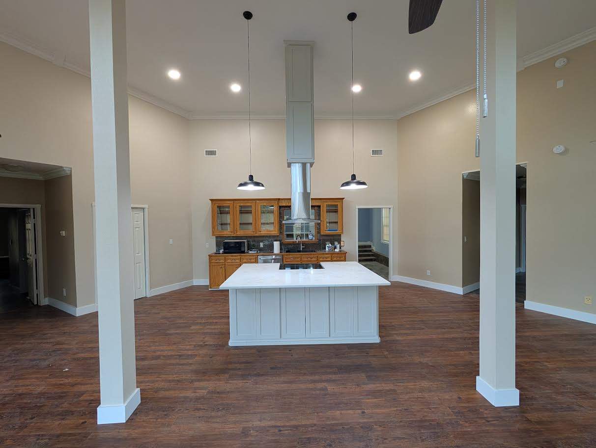 SUCH A BEAUTIFUL SPACE TO OPEN UP WITH NEW FLOORS, ISLAND & COUNTERTOP